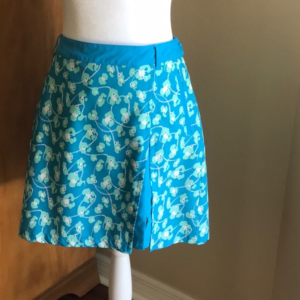 Bright blue and white golf sqort